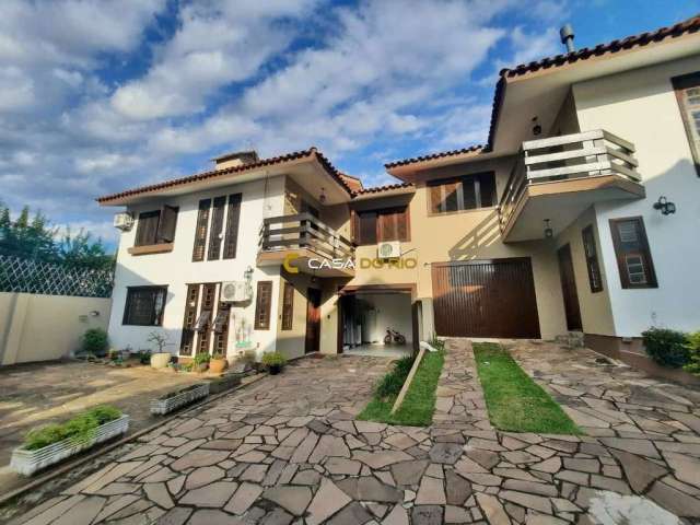 Casa em condomínio fechado com 3 quartos à venda na Mario Totta, 1925, Camaquã, Porto Alegre por R$ 650.000