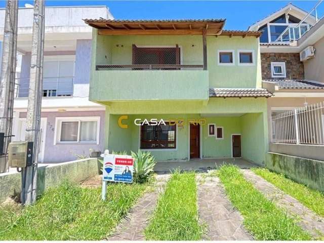 Casa com 3 quartos à venda na Rua Felipe Arísio, 186, Hípica, Porto Alegre por R$ 549.000