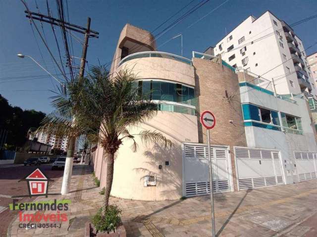 Sobrado com 3 dormitórios à venda, 264 m² por R$ 775.000,00 - Tupi - Praia Grande/SP