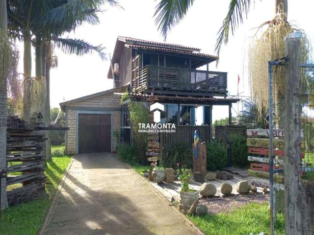 Esta encantadora casa está disponível para venda no tranquilo bairro Morro Agudo em Araranguá. SC