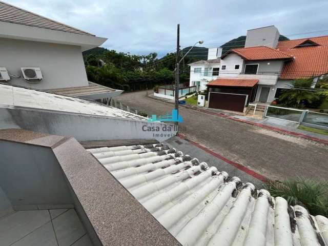 Casa em condomínio fechado com 3 quartos à venda no Cacupé, Florianópolis  por R$ 2.399.000