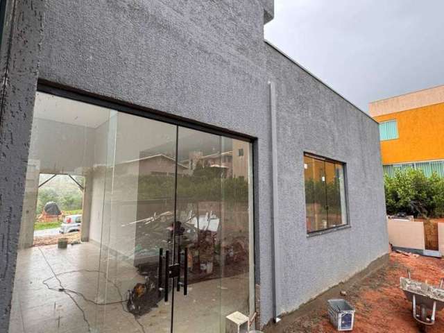 Casa com 3 dormitórios à venda, 192 m² por R$ 1.450.000 - Condomínio Serra dos Bandeirantes - Mário Campos/MG