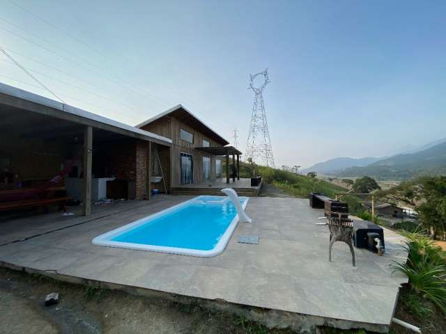 Sitio Interior de Camboriu | Casa de Madeira com piscina - 2 Dormitórios