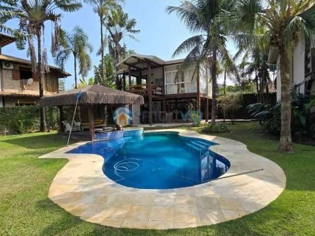 Casa dos Sonhos em Camburizinho: 5 suítes, seu conforto a Poucos Passos da Praia