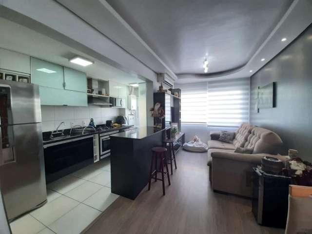 Apartamento no bairro Santana em Porto Alegre. Impecável, 2 dormitórios, living 2 ambientes, cozinha americana planejada com churrasqueira, ar condicionado, semi mobiliado com móveis fixos de excelent