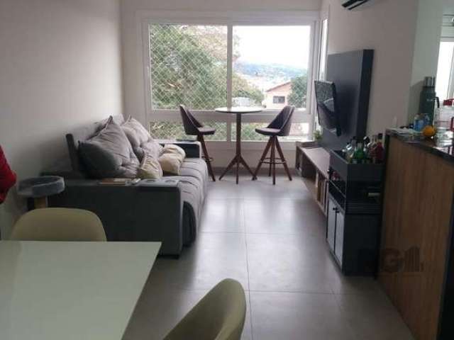 Venda de apartamento de 2 quartos com uma suíte e 2 banheiros. Com ar condicionado, churrasqueira , junker, cortinas de mármore, mobiliada toda nova, 2 vagas de garagem e elevador.&lt;BR&gt;&lt;BR&gt;