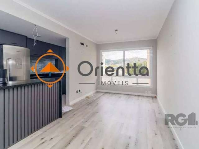 Imobiliária Orientta ALUGA excelente apartamento SEMIMOBILIADO, com 3 dormitórios, sendo 1 súite, 2 banheiros e 2 vagas de garagem. Living amplo para 2 ambientes. Cozinha no estilo americana, com banc