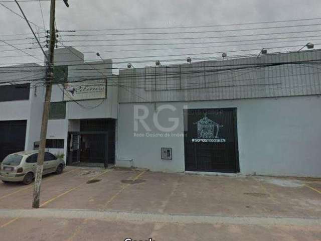 Prédio comercial para comprar na Av. Ary Tarragô, em local de grande fluxo de veículos e pedestres.São 2.000m² de área construída. Possui salão, pavilhão grande, auditório, salas para escritórios, cop