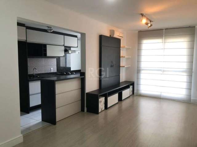 Excelente apartamento semi mobiliado, de 3 dormitórios sendo 01 suíte, cozinha americana montada com churrasqueira, área de serviço, living para dois ambientes com sacada, banheiro social, 01 vaga de 