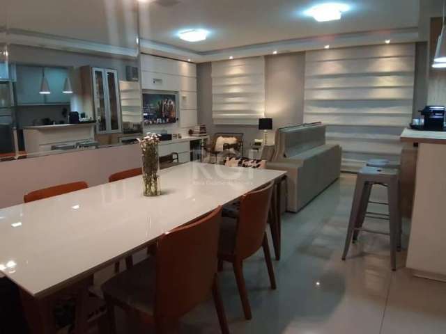 Lindo apartamento de 3 dormitórios, TRANSFORMADO EM 2 com living estendido, TODO MOBILIADO. &lt;BR&gt;O apartamento possui 1 suíte, com mais 1 banheiro social, piso porcelanato de alto padrão e armári