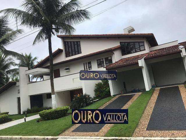 Casa com 4 suítes no Guarujá - CA 230106M