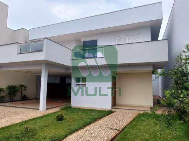 Casa em condomínio fechado com 3 quartos à venda no Jardim Karaíba, Uberlândia  por R$ 1.270.000