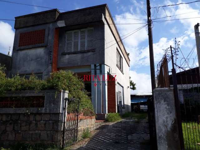 Casa com 3 quartos à venda na Rua Caldre e Fião, 524, Santo Antônio, Porto Alegre por R$ 580.000