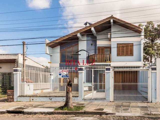 Casa com 4 quartos à venda na Rua Nossa Senhora das Graças, 35, Glória, Porto Alegre por R$ 997.000
