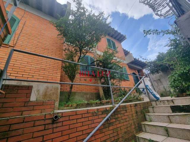 Casa com 3 quartos à venda na Rua Cuiabá, 308, Medianeira, Porto Alegre por R$ 430.000