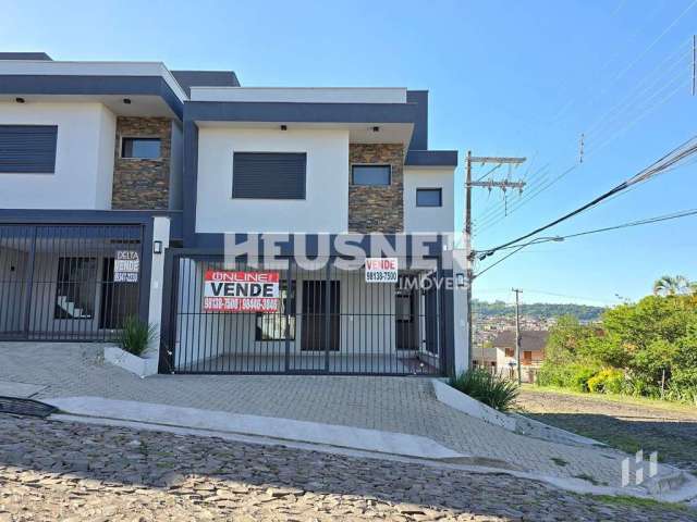 Casa com 3 dormitórios à venda, 113 m² por R$ 609.000,00 - Petrópolis - Novo Hamburgo/RS