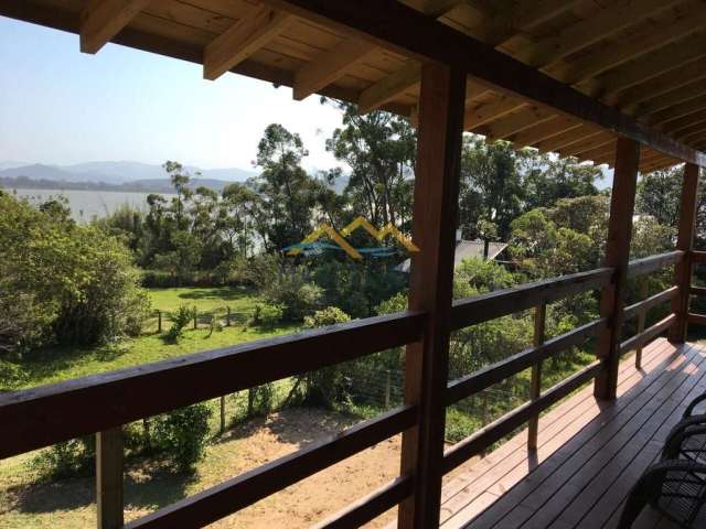 linda casa com vista lagora em ibiraquera