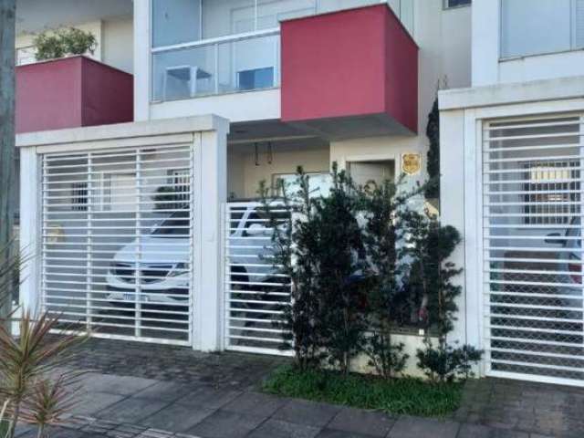 Casa com 3 quartos à venda na Delegado Ari Raupp, Morada das Palmeiras, Torres, 109 m2 por R$ 800.000