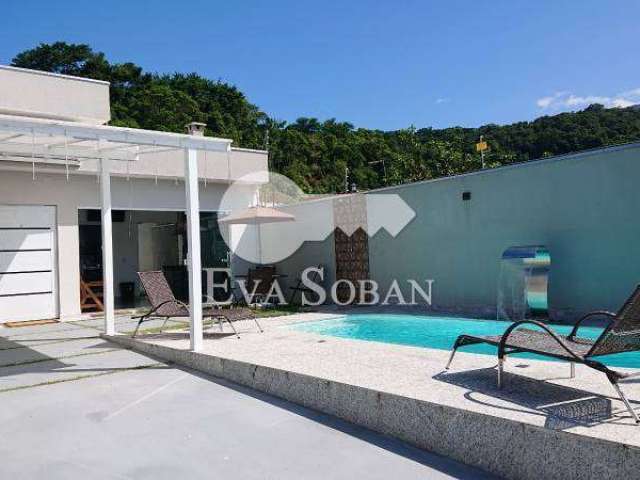 Casa com piscina aquecida, espaço gourmet Massaguaçu