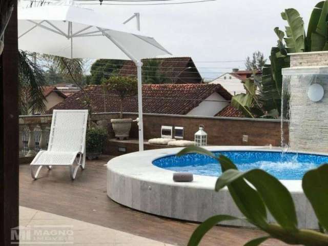 Casa com 4 dormitórios à venda, 293 m² por R$ 1.100.000 - Praia das Palmeiras - Caraguatatuba/SP