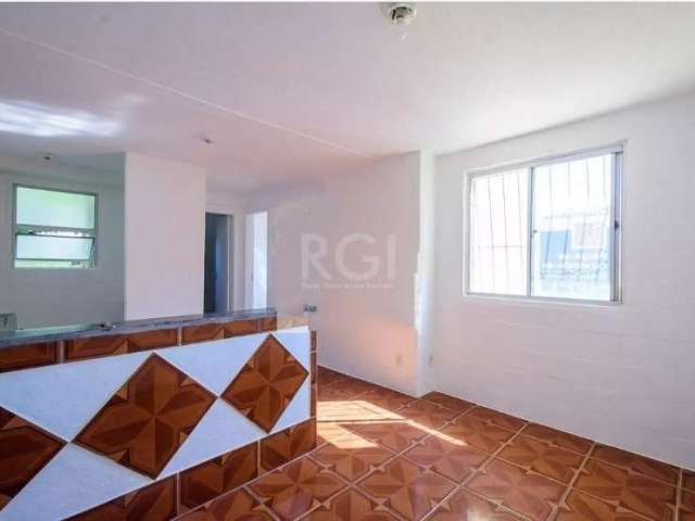 Este apartamento de 2 dormitórios com 1 vaga para o carro está localizado no bairro Vila Nova em Porto Alegre - RS, em um condomínio residencial chamado Jardim Imperial. O apartamento possui uma sala 