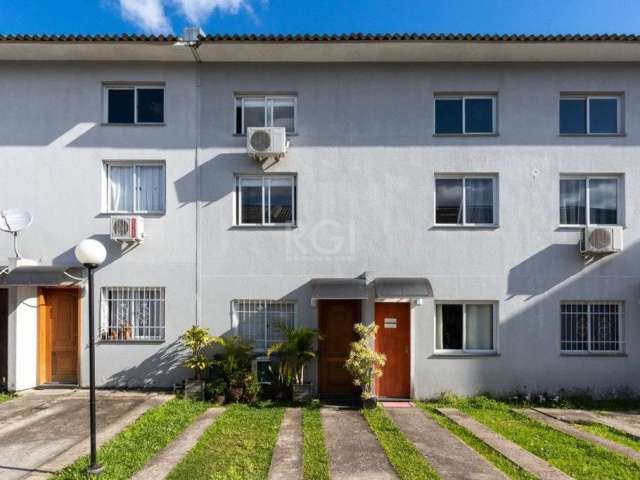 Casa em condomínio - 3 dormitórios, sendo 1 suíte - Lareira - Churrasqueira - Pátio privativo - Bairro Hípica&lt;BR&gt;&lt;BR&gt;Casa em condomínio, living dois ambientes, lavabo, cozinha planejada e 