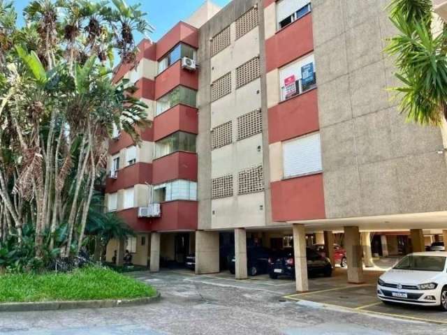 Apartamento de dois Quartos no bairro Teresópolis, sala com dois ambientes, sacada integrada com churrasqueira, cozinha com área de serviço separada e banheiro Auxiliar., uma vaga de garagem coberta e