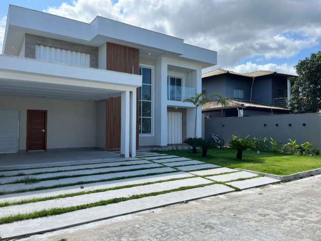 Casa de alto padrão em condomínio fechado - 4 suítes - piscina - área gourmet- garagem pra 4 carros