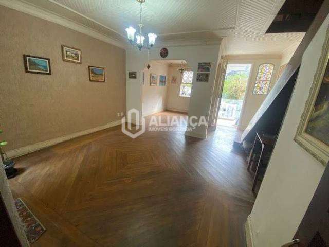 Casa com 3 dormitórios à venda, 109 m² por R$ 850.000,02 - Gonzaga - Santos/SP