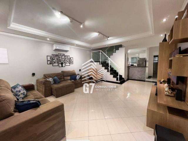 Sobrado com 3 dormitórios à venda, 121 m² por R$ 595.000,00 - Maracanã - Praia Grande/SP