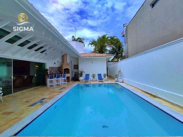 Casa com 5 dormitórios à venda, 270 m² por R$ 2.200.000,00 - Jardim Acapulco - Guarujá/SP