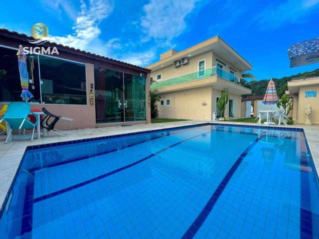 Casa de alto padrão com 6 suítes - piscina - sauna - churrasqueira - estúdio - 6 vagas - Jardim Albamar, Guarujá.