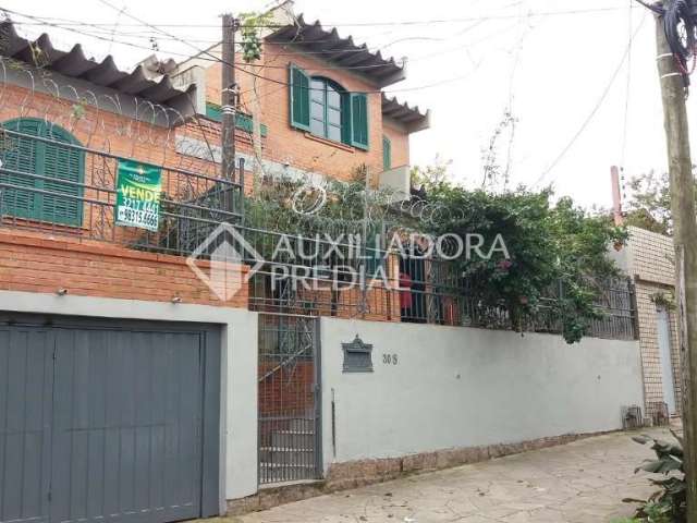 Casa em condomínio fechado com 3 quartos à venda na Rua Cuiabá, 308, Medianeira, Porto Alegre, 170 m2 por R$ 398.500