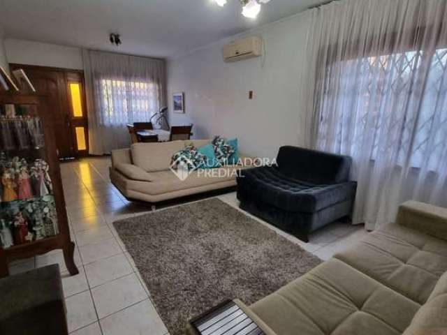 Casa com 3 quartos à venda na Rua Albion, 1054, Passo do Feijó, Alvorada, 148 m2 por R$ 630.000