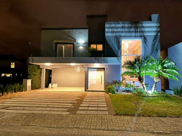 Casa em condomínio fechado com 4 quartos à venda na Honório Germano, 2008, Condomínio Dubai Resort, Capão da Canoa, 230 m2 por R$ 1.799.000