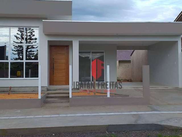 Casa com 3 dormitórios à venda, 132 m² por R$ 625.000,00 - Paraíso - Torres/RS