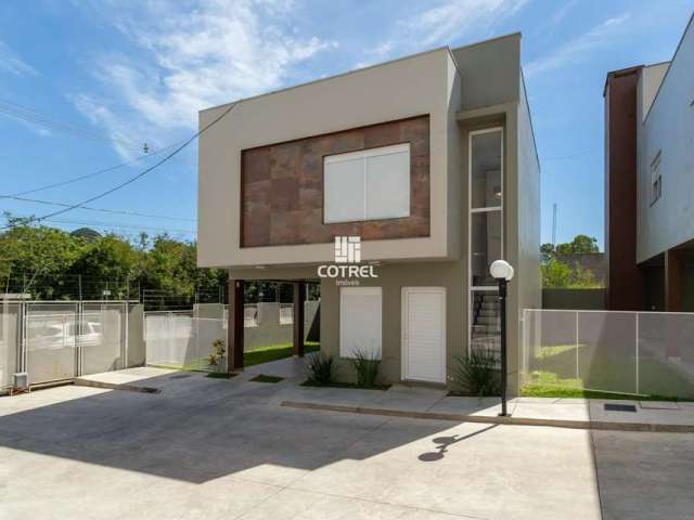 Casa 3 dormitórios sendo 3 suítes e 2 vagas de garagem no Bairro Diácono João Lu