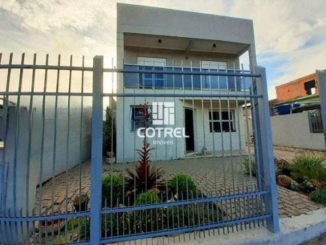 Casa 4 dormitórios 1 suíte 2 vagas de garagem localizada no Bairro Urlândia na c