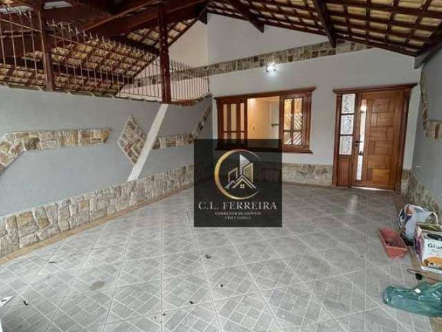 Casa com 3 dormitórios à venda, 123 m² por R$ 570.000,00 - Maracanã - Praia Grande/SP