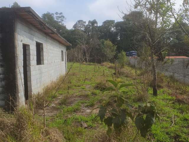 Terreno 1.000 mts com casa sem acabamento