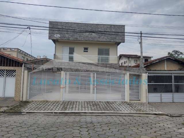 Casa sobreposta alta de condomínio na Ocian em Praia Grande - SP, 02 dormitórios