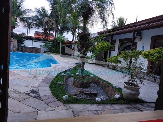 Casa com piscina para Venda e Locação Maracanã, Praia Grande SP 5 dormitórios sendo 5 suítes, 2 salas, cozinha, área de serviço, 6 banheiros, e edícul