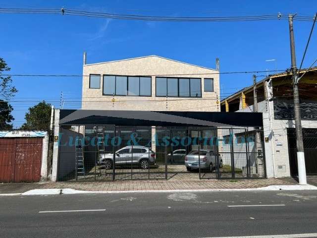 Galpão comercial à venda em Praia Grande-SP, no bairro Flórida: 2 salas, 2 banheiros, 3 vagas de garagem, 500m².