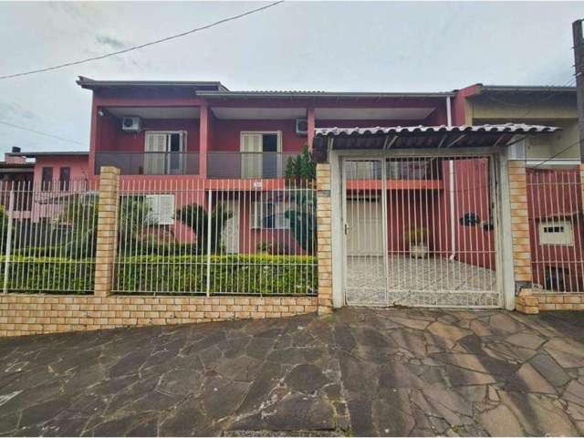 Casa com 2 quartos e apartamento com 2 quartos, bairro Paraíso, Sapucaia do Sul -RS - comporta duas famílias.