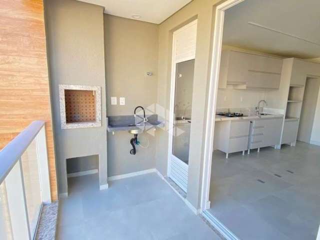 Apartamento  dormitório sendo   suíte e vaga de garagem