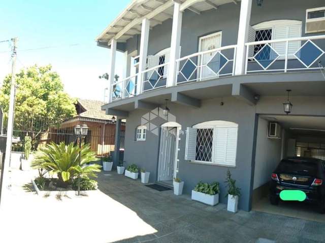 Casa com 5 dormitórios no Sarandi