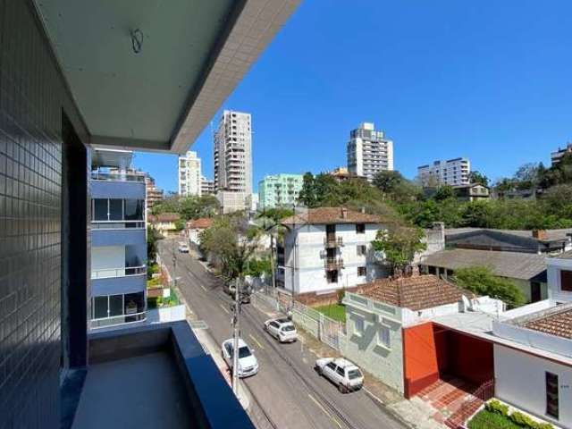 Apartamento novo à venda com 02 dormitórios,  01 suíte e sacada no bairro Nossa Senhora de Lourdes em Santa Maria, financiável.