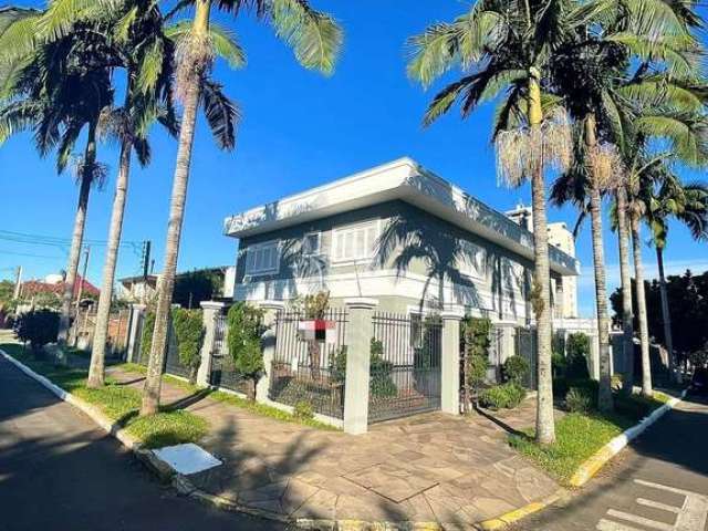 Ótima casa tipo sobrado 5 dormitórios, 3 suítes, piscina, 5 vagas no mal rondon em canoas.