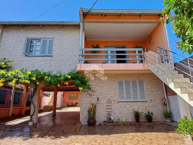 Casa com 2 dormitórios,  Rio Branco em Canoas.