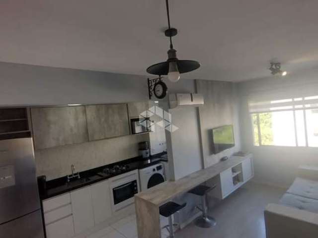 Apartamento de 2 dormitórios sala de estar e jantar integrado a cozinha. Com Uma vaga coberta, aceita financiamento. Bairro Centro/ Canoas.